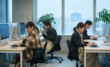 寒さを我慢する職場